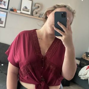 Plus size burgundy blouse with lace accent
